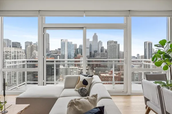 a living room with furniture city view
