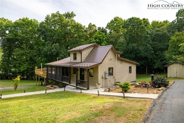 a backyard of a house with lots of green space