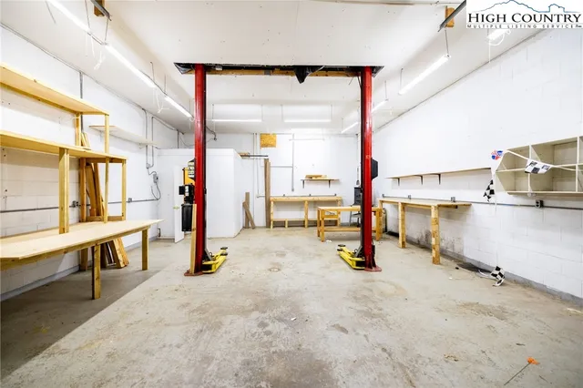 a view of a forest with a houses