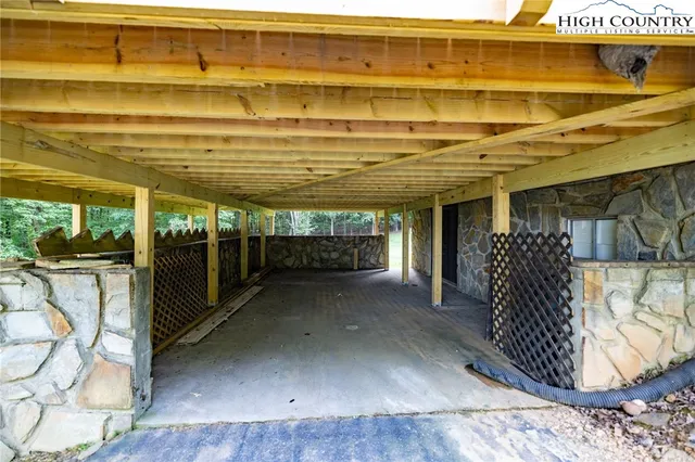 a view of a house with large pool
