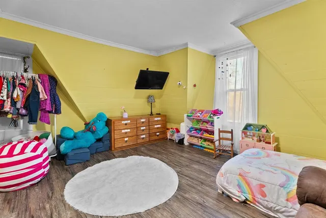 a bathroom with a sink toilet and mirror