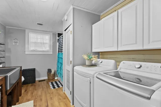 a front view of a house with yard porch and seating area