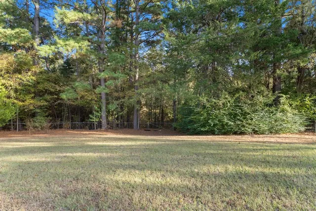 a picture of a bathroom with a shower