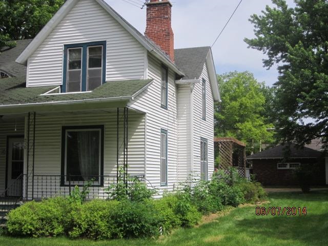 210 East Brayton Road Mount Morris, IL 61054 - Photo 3 of 11 a view of a house with a yard