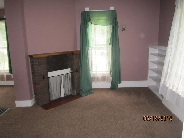 210 East Brayton Road Mount Morris, IL 61054 - Photo 4 of 11 an empty room with windows
