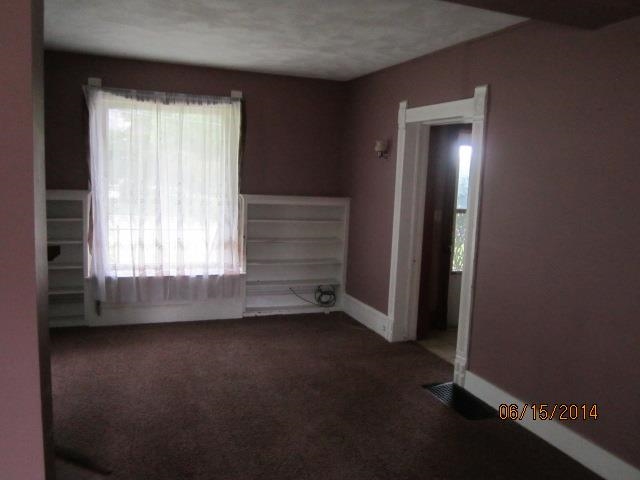 210 East Brayton Road Mount Morris, IL 61054 - Photo 5 of 11 an empty room with a window