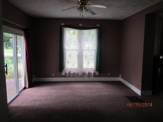 210 East Brayton Road Mount Morris, IL 61054 - Photo 6 of 11 an empty room with a window