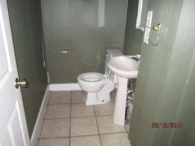 210 East Brayton Road Mount Morris, IL 61054 - Photo 7 of 11 a bathroom with a toilet and a sink