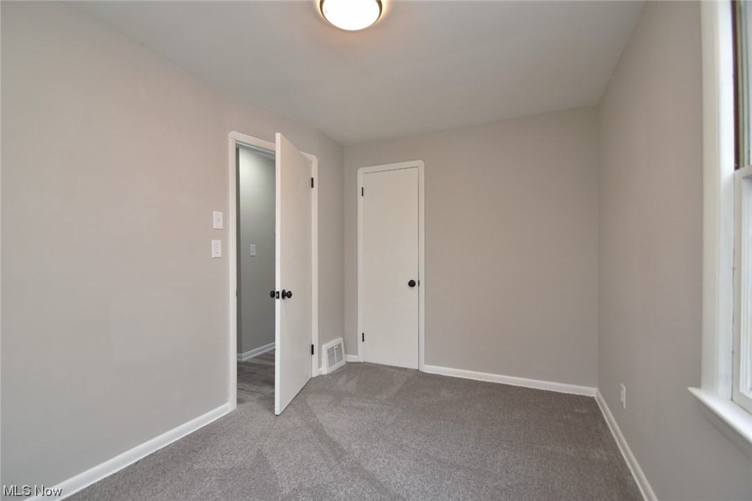 21307 Libby Road Maple Heights, OH 44137 - Photo 18 of 31 Bedroom 2 on First Floor/ New Carpet and Paint