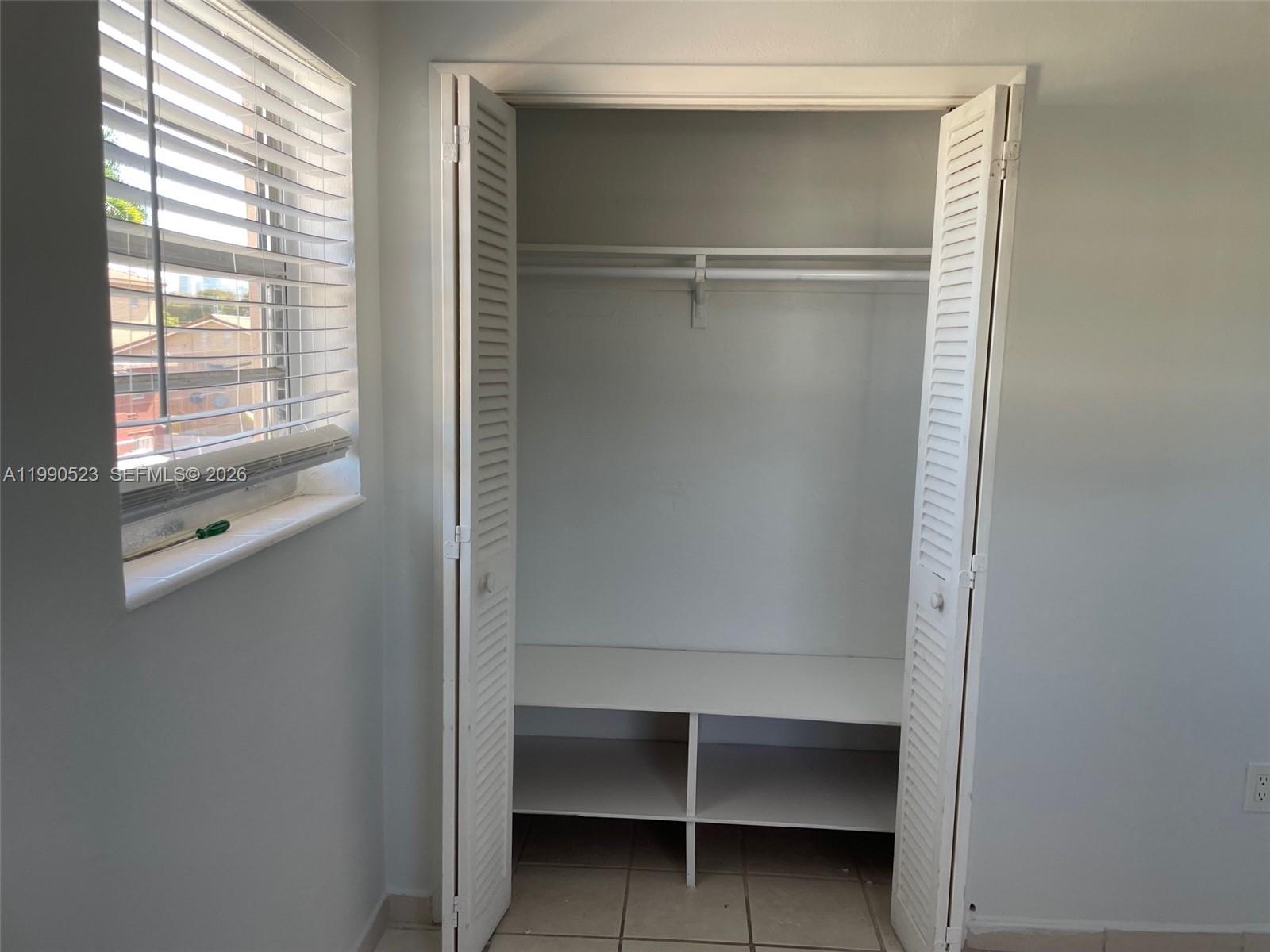 1787 Southwest 7th Street, Unit 7 Miami, FL 33135 - Photo 8 of 9 a view of an empty walk in closet