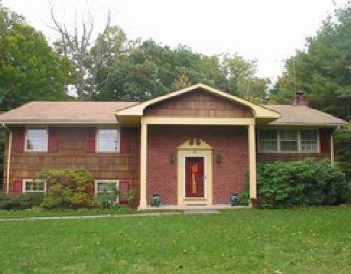 48 Cottontail Road Norwalk, CT 06854 - Photo 1 of 1 a front view of a house with a yard
