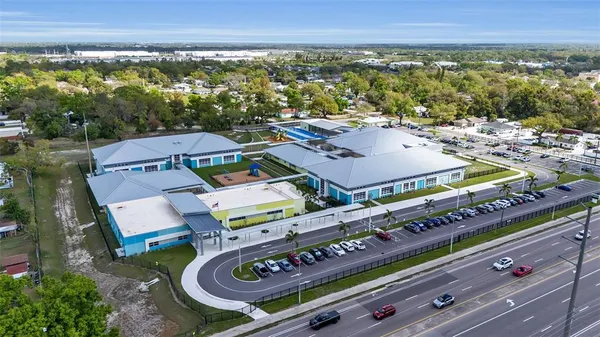 an aerial view of a chairs and table on the terrace
