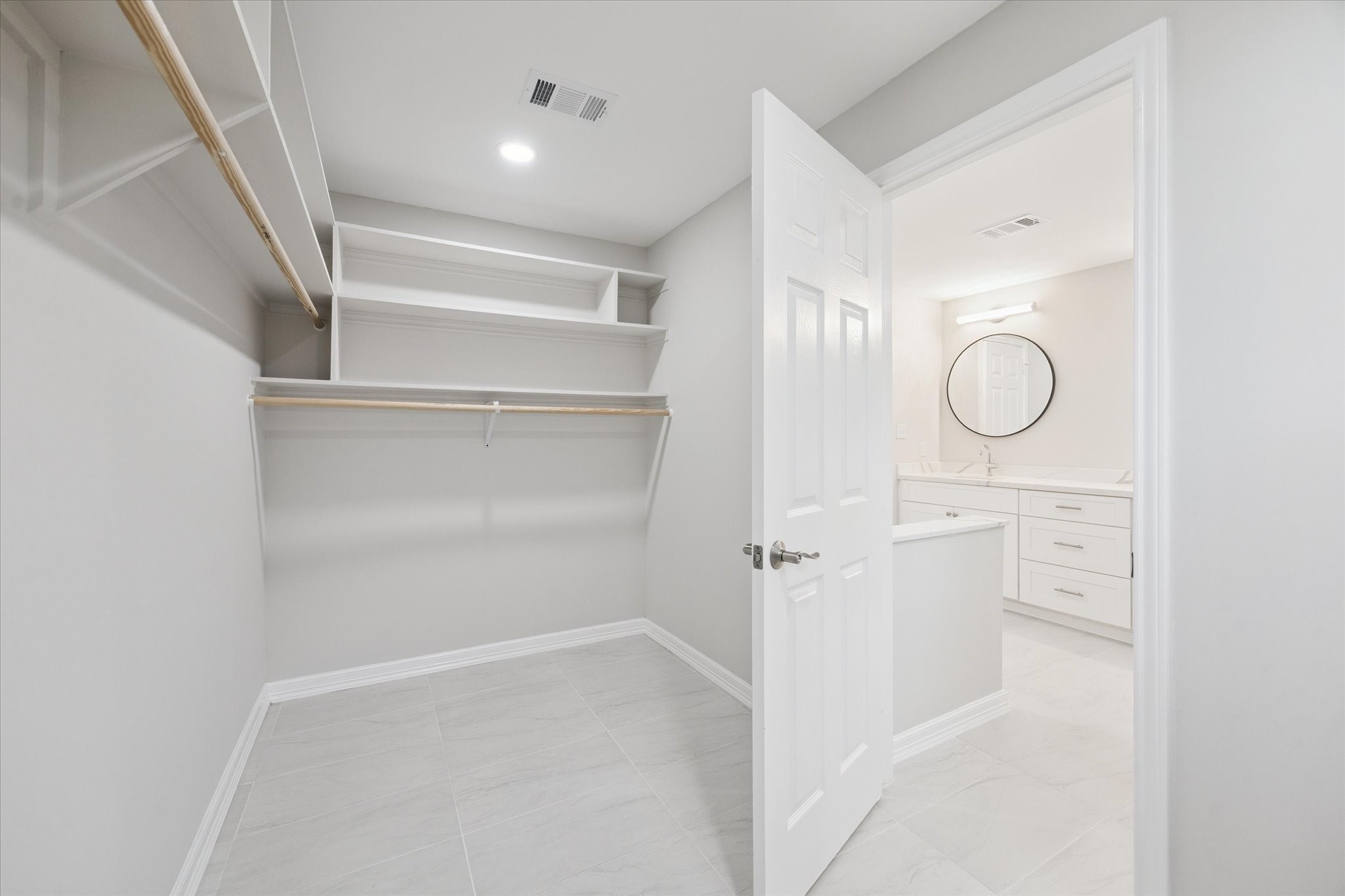 10009 Lazy Oaks Street Houston, TX 77080 - Photo 15 of 23 a view of small space with racks on the wall