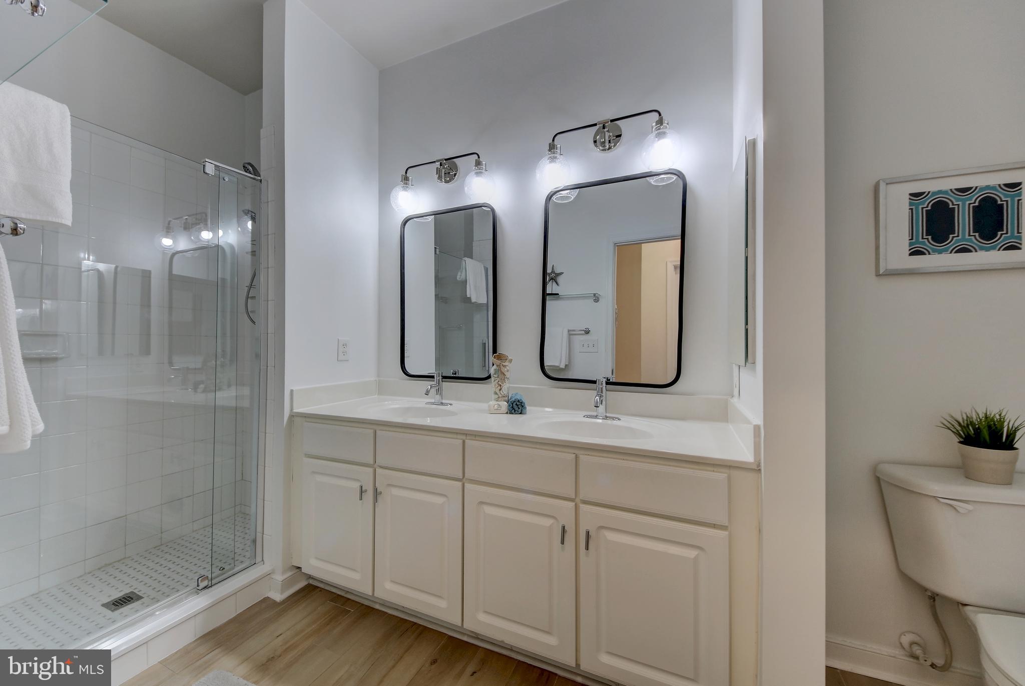 8045 Newell Street, Unit 118 Silver Spring, MD 20910 - Photo 12 of 27 Primary bath is renovated and stylish