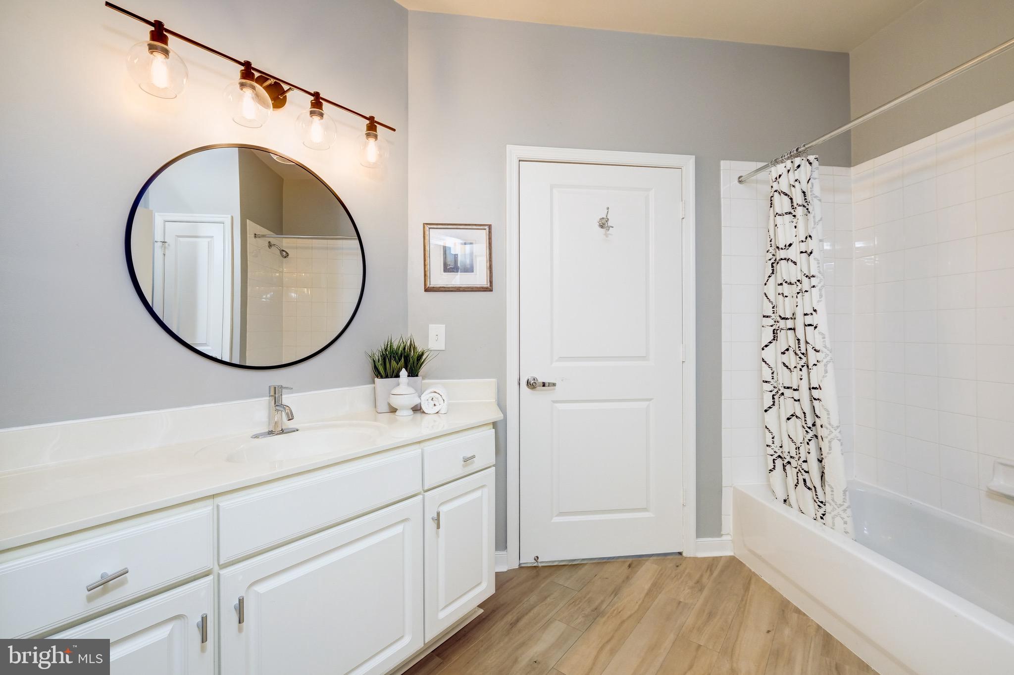8045 Newell Street, Unit 118 Silver Spring, MD 20910 - Photo 16 of 27 Guest bath - updated and pristine