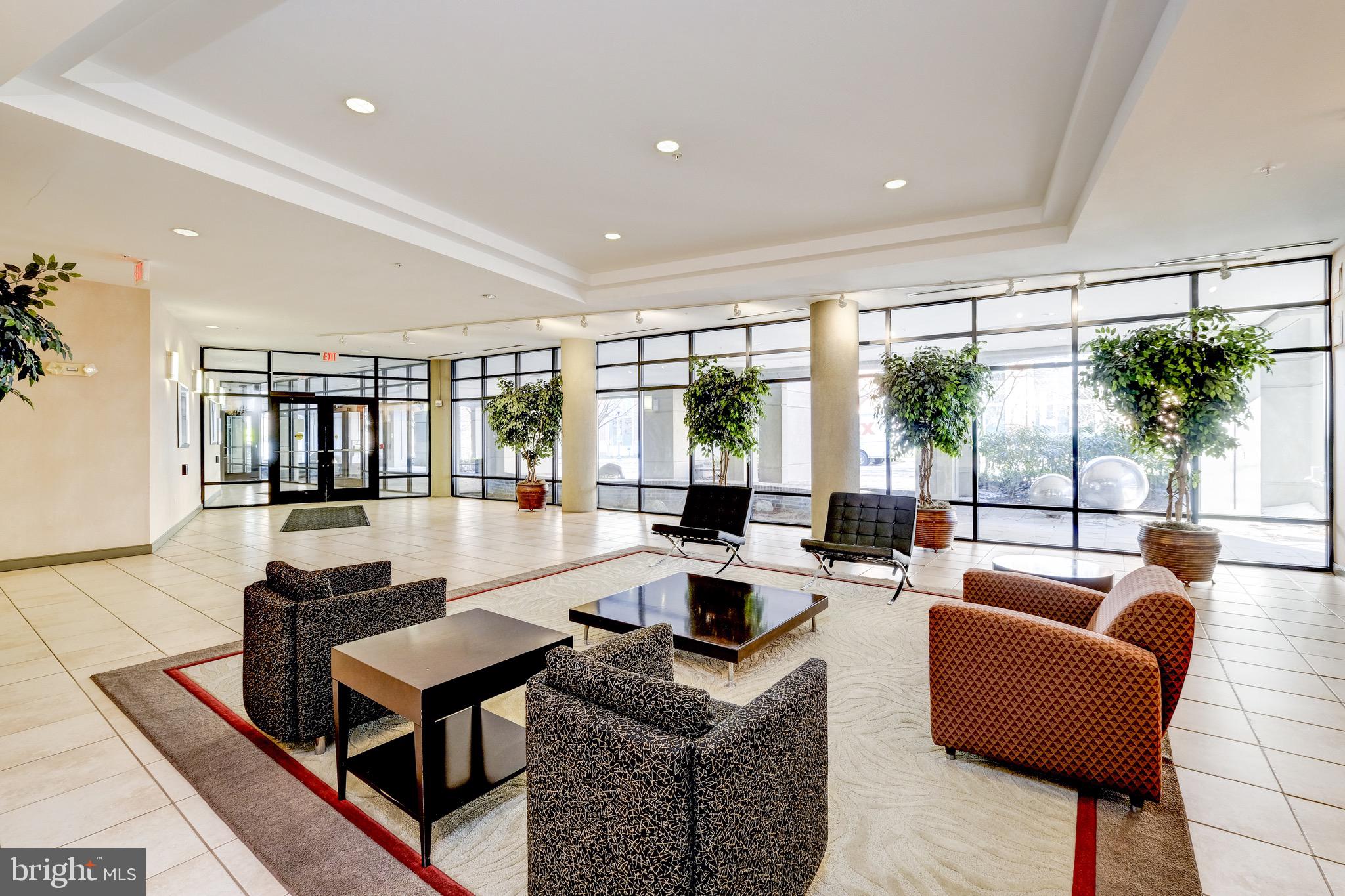 8045 Newell Street, Unit 118 Silver Spring, MD 20910 - Photo 19 of 27 Lobby is welcoming, building is well-maintained