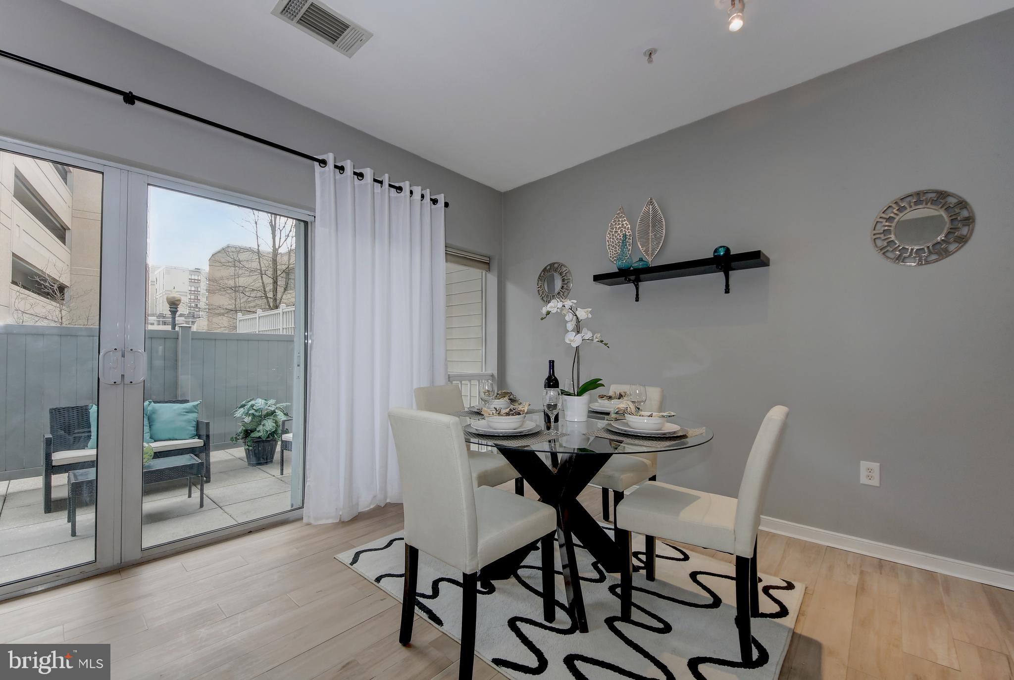 8045 Newell Street, Unit 118 Silver Spring, MD 20910 - Photo 6 of 27 Dining area or dine al fresco