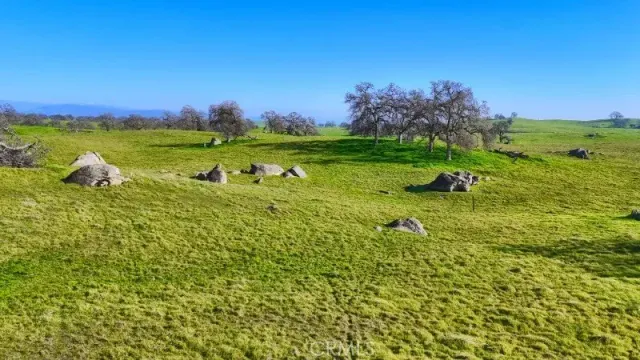 a view of a golf course with a lake