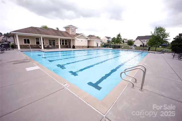a view of house with outdoor seating space