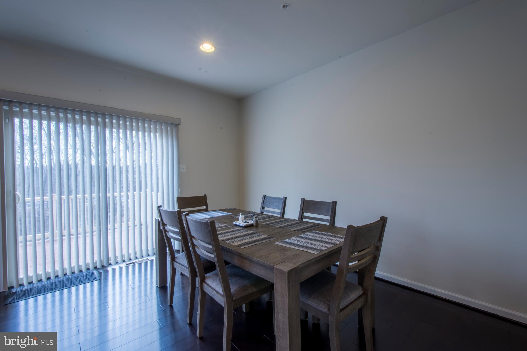 7809 Rappaport Drive Jessup, MD 20794 - Photo 12 of 84 Dining Area With Sliding Door To Rear Deck