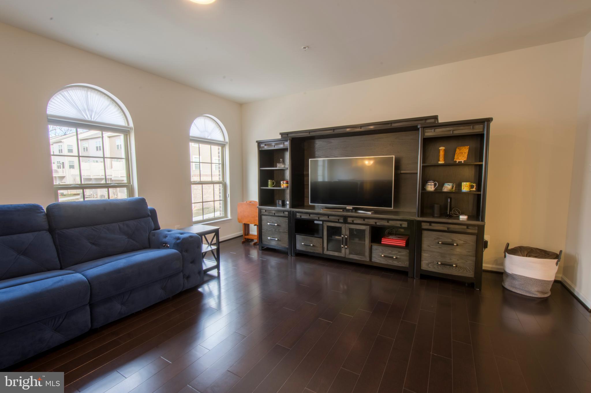 7809 Rappaport Drive Jessup, MD 20794 - Photo 17 of 84 Living Room With Large Windows & Gleaming Floors