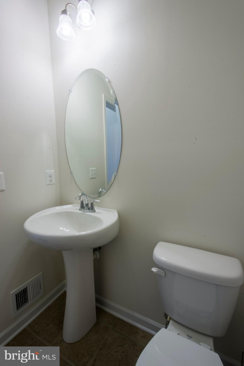 7809 Rappaport Drive Jessup, MD 20794 - Photo 18 of 84 Pedestal Sink In Half Bath On Main Level