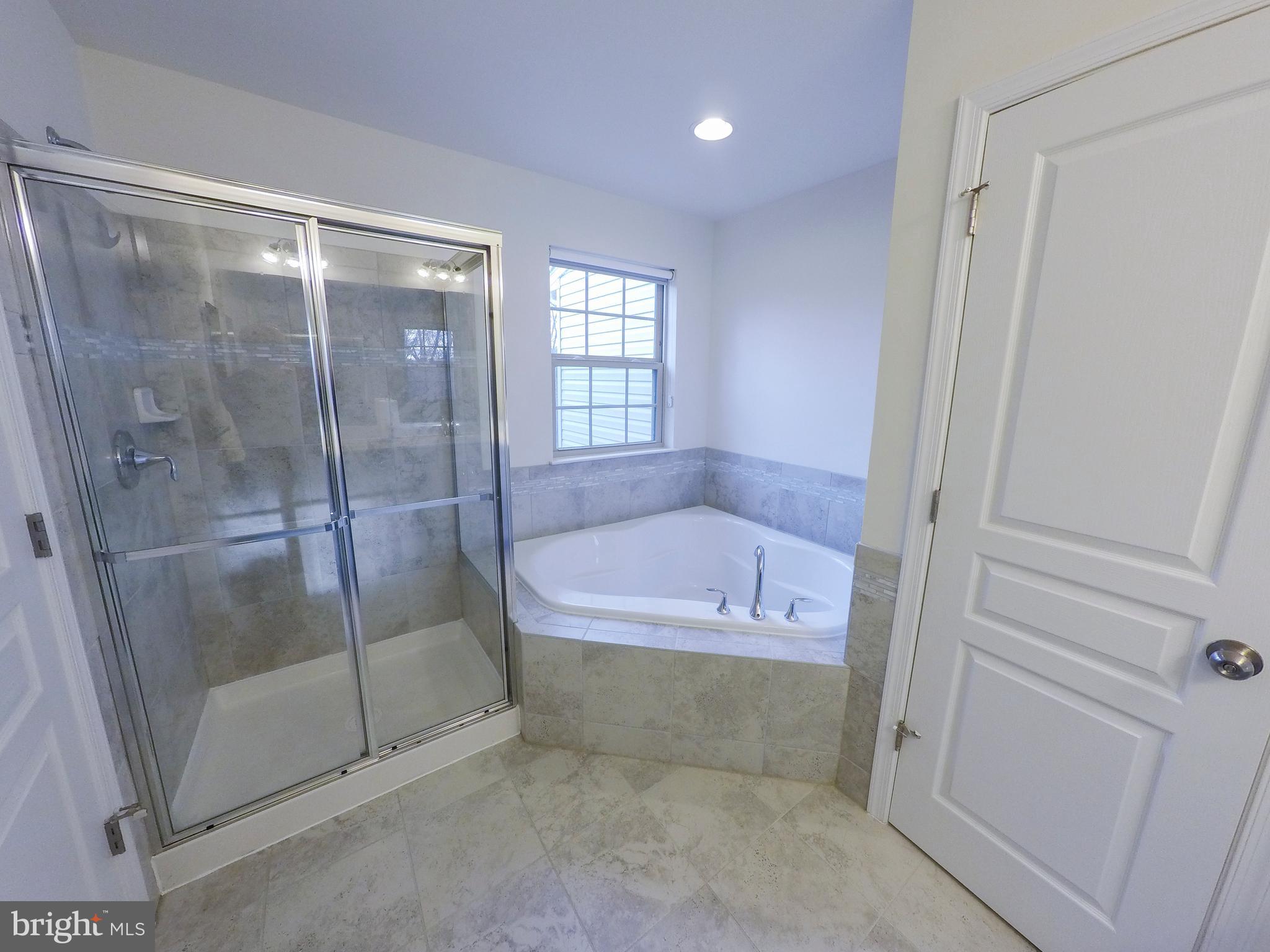 7809 Rappaport Drive Jessup, MD 20794 - Photo 28 of 84 Owners En-Suite Bath With Tub And Tile Shower
