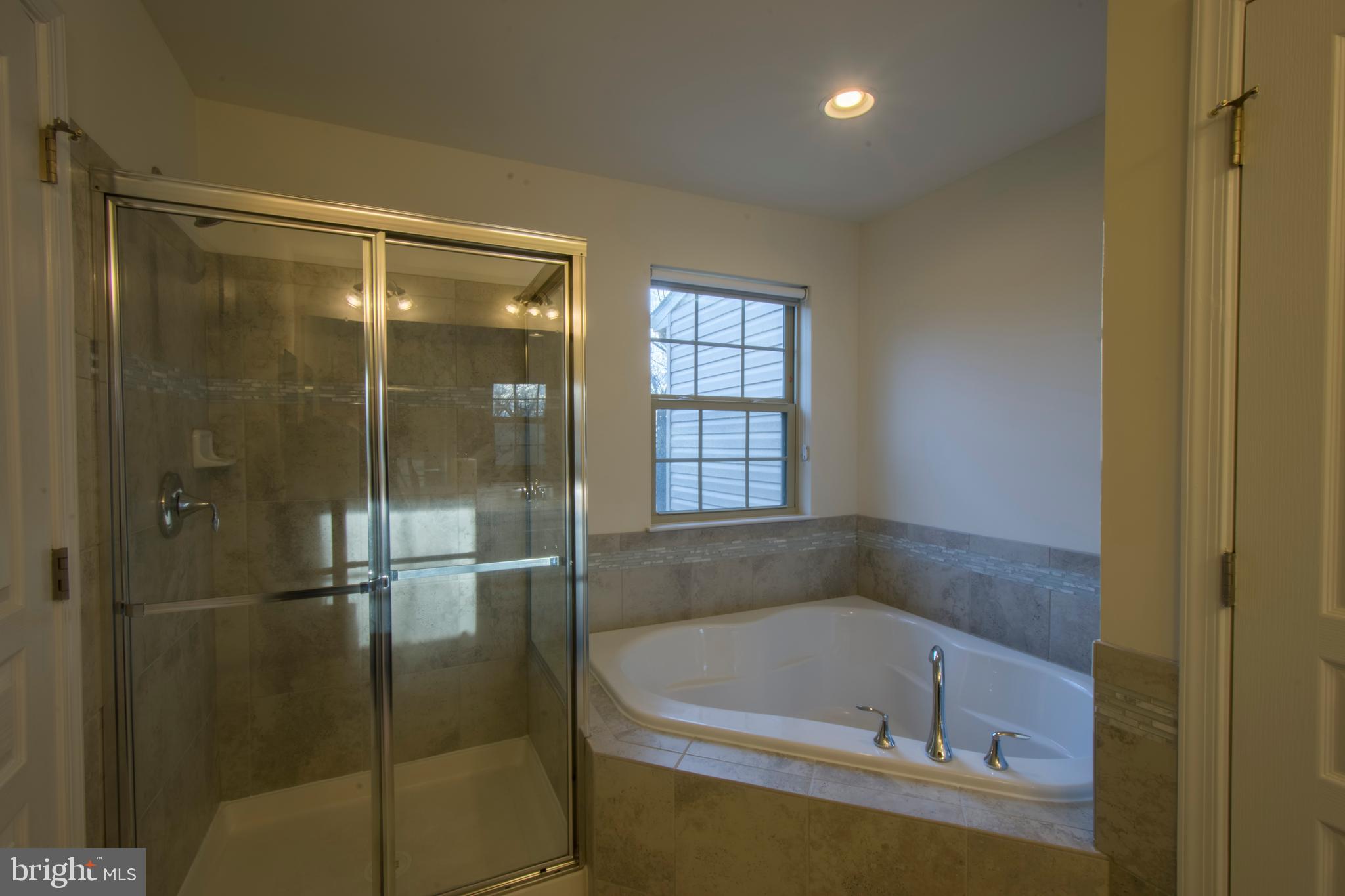 7809 Rappaport Drive Jessup, MD 20794 - Photo 29 of 84 Owners Bathroom With Tub & Shower