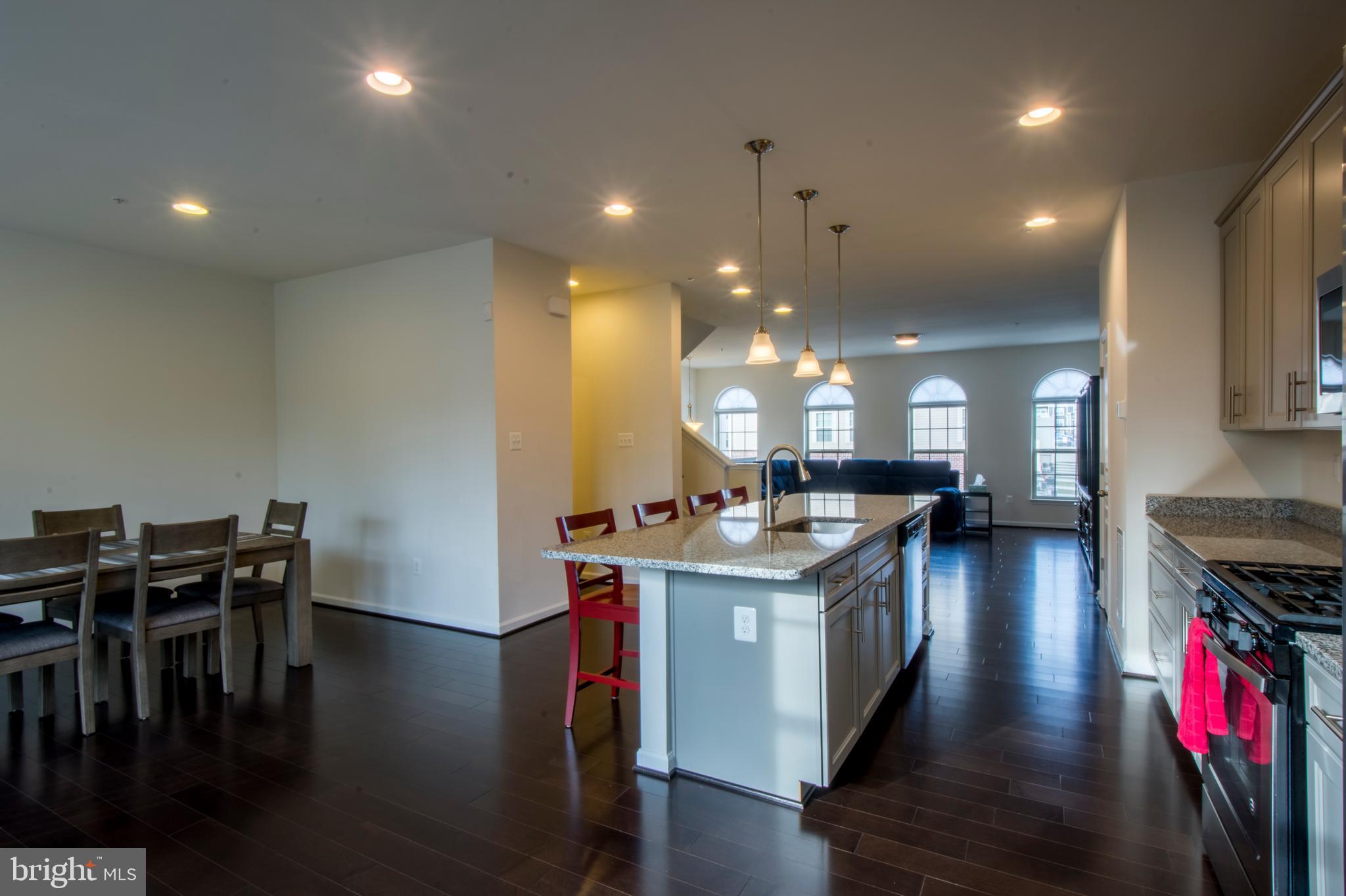 7809 Rappaport Drive Jessup, MD 20794 - Photo 4 of 84 Open Kitchen Plan With Gorgeous Floors