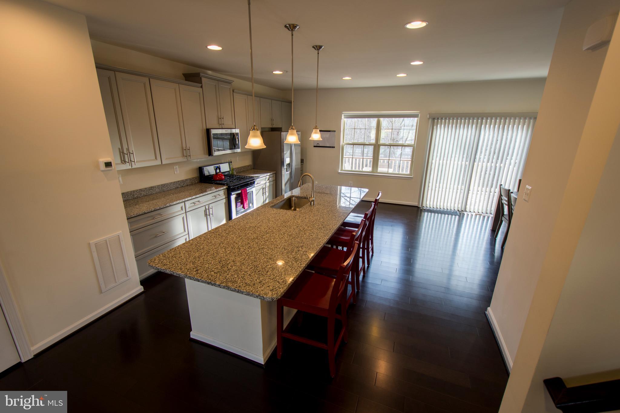 7809 Rappaport Drive Jessup, MD 20794 - Photo 64 of 84 Wide Plank Floors Throughout Kitchen