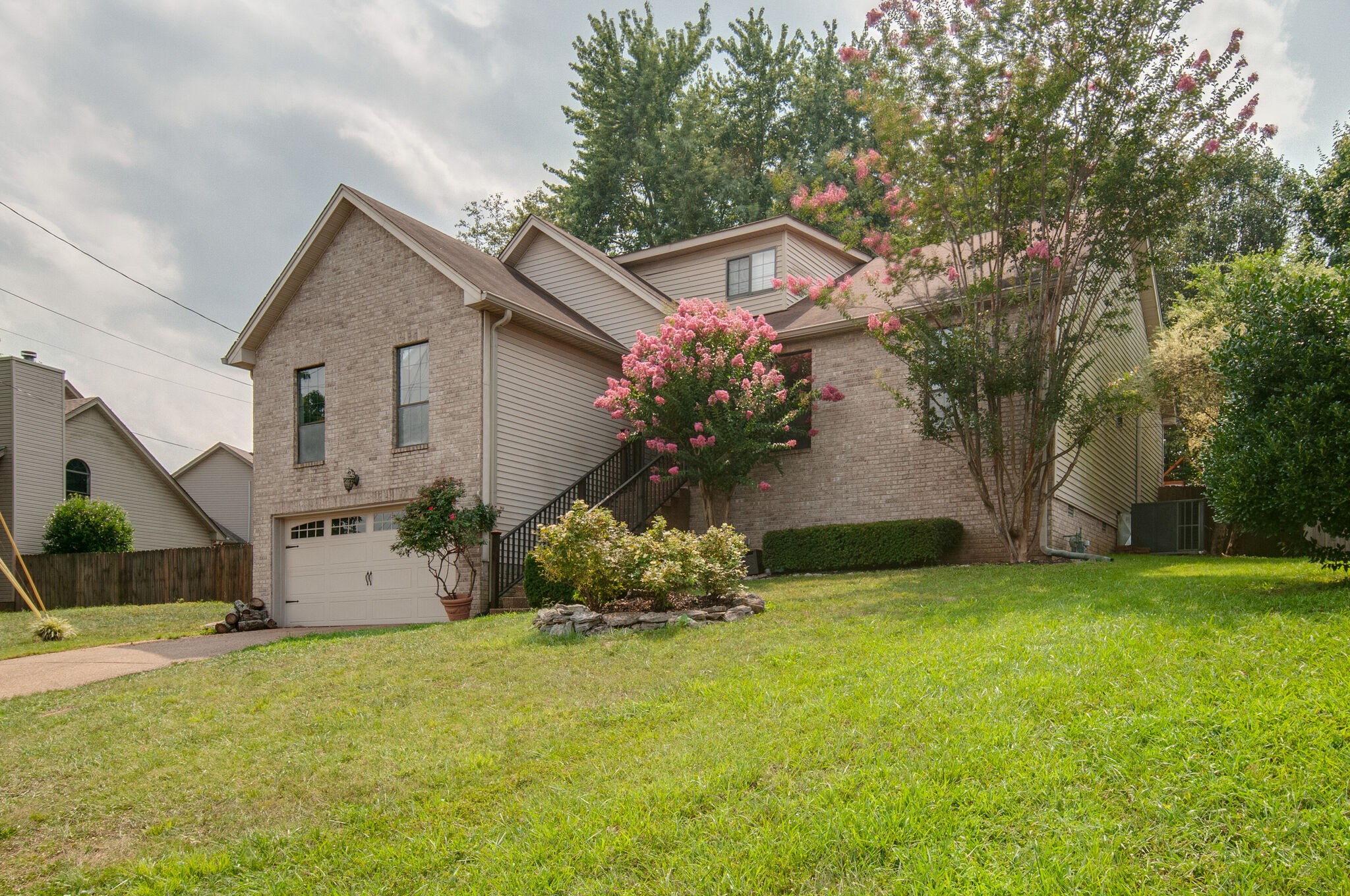 904 Fallview Trail Nashville, TN 37211 - Photo 2 of 38 a front view of house with yard and trees