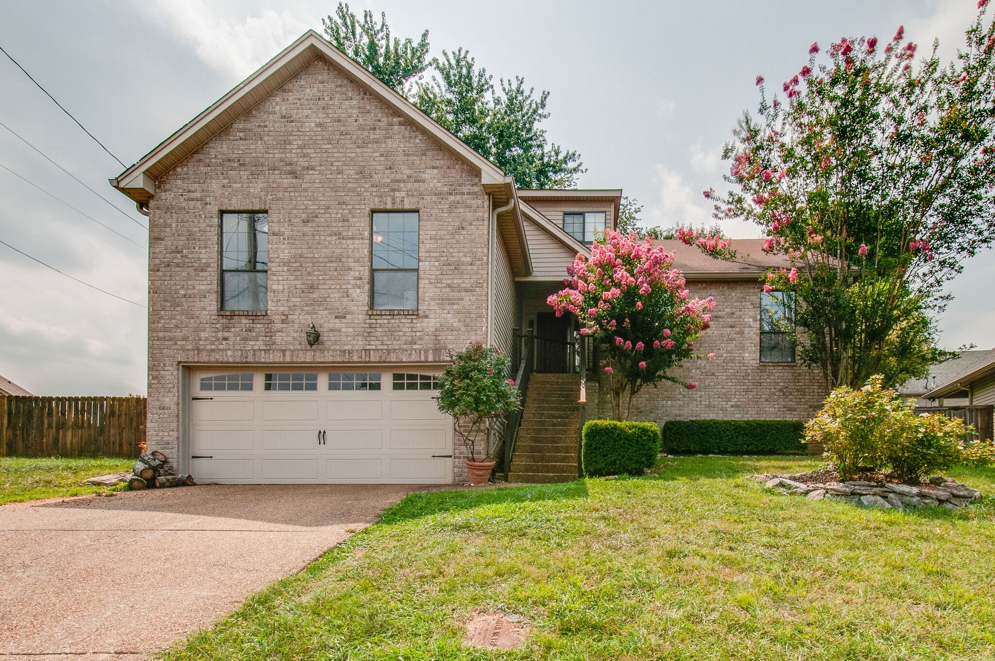 904 Fallview Trail Nashville, TN 37211 - Photo 3 of 38 a front view of a house with a yard and garage