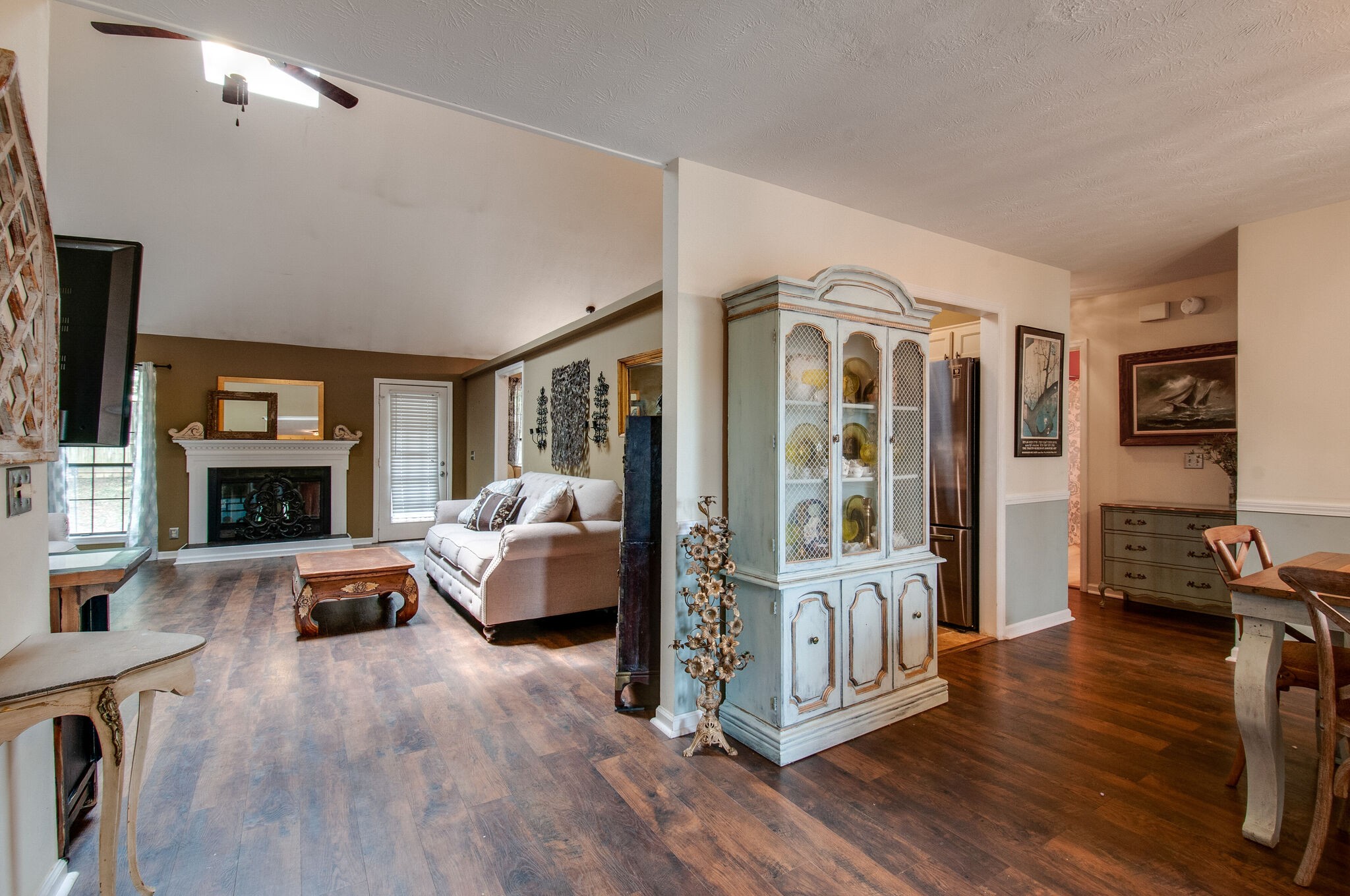 904 Fallview Trail Nashville, TN 37211 - Photo 8 of 38 a living room with furniture wooden floor and a fireplace