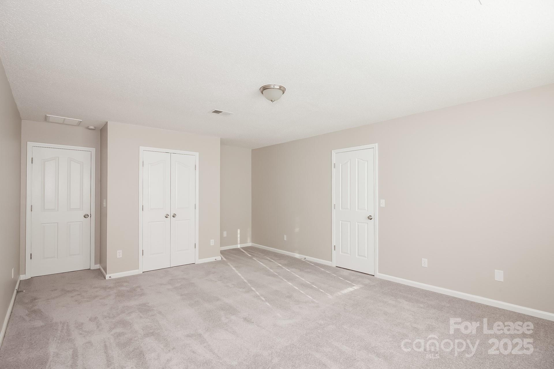 5537 Lemley Road Northwest Concord, NC 28027 - Photo 10 of 17 a view of an empty room