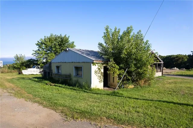 an aerial view of a house with mountain view
