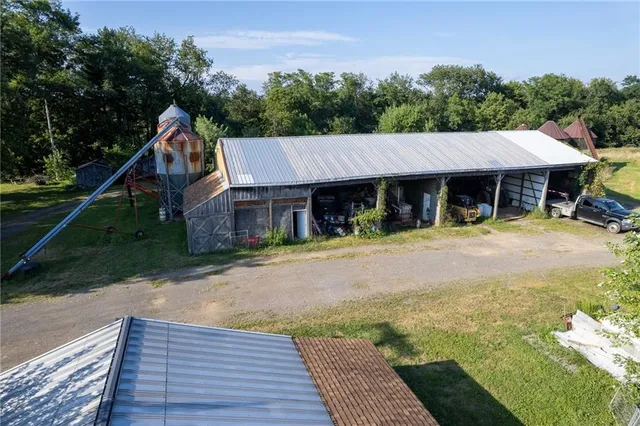 a aerial view of a house with a yard