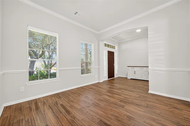 a living room with furniture fireplace and flat screen tv