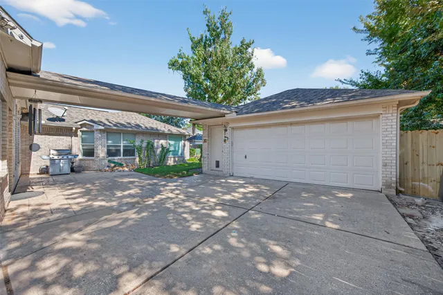 a view of a back yard of the house