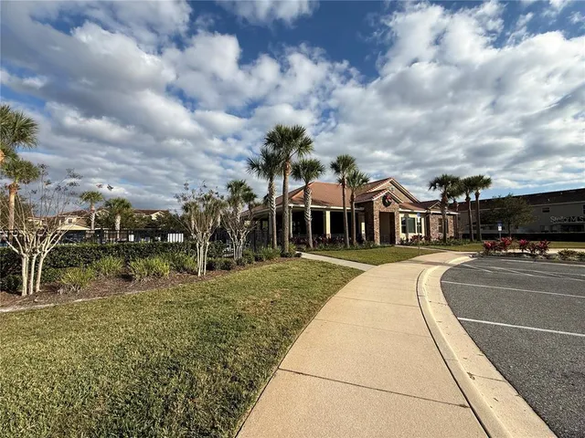 a view of a building with a yard