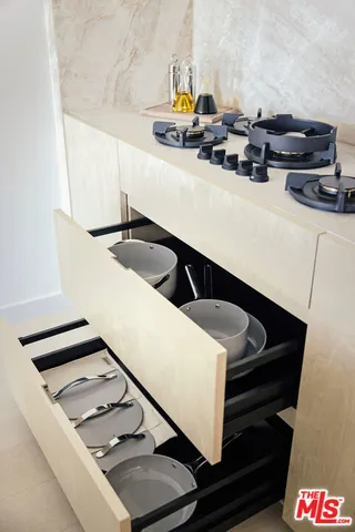 a kitchen with a stove and a sink