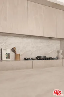 a bathroom with a tub shower and sink