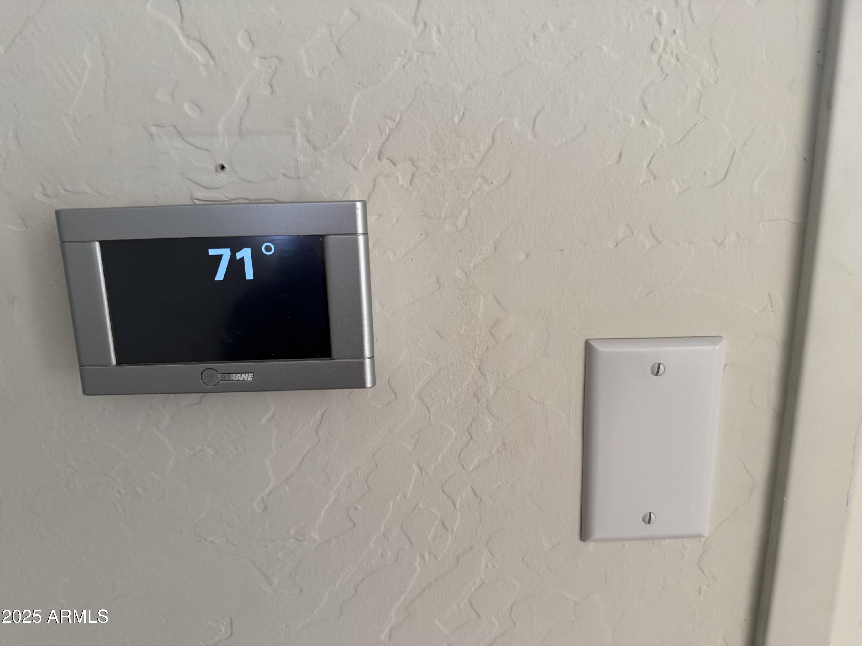 9065 East Gary Road, Unit 124 Scottsdale, AZ 85260 - Photo 32 of 52 Thermostat/alarm area
