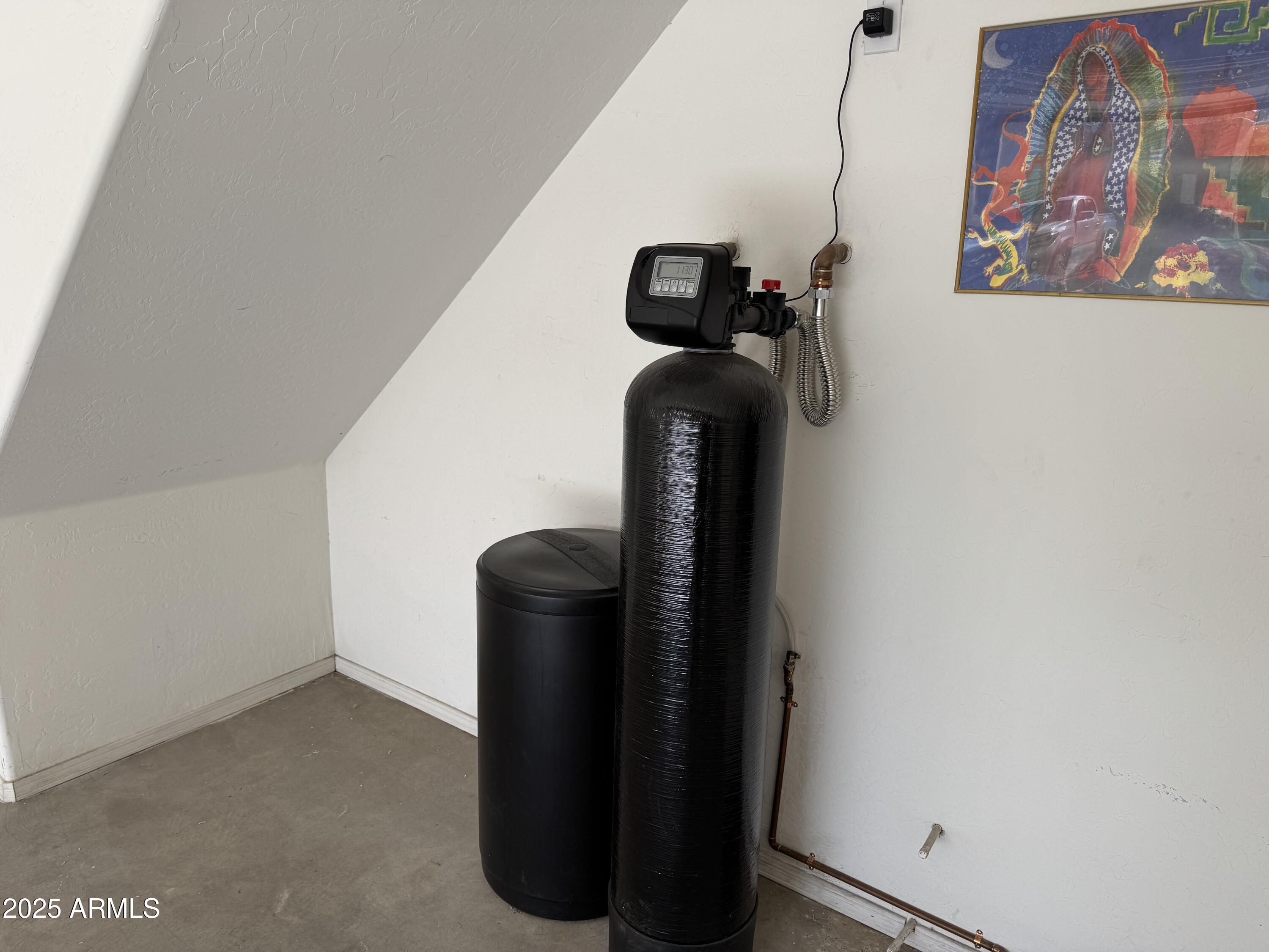 9065 East Gary Road, Unit 124 Scottsdale, AZ 85260 - Photo 35 of 52 Water softening unit conveys