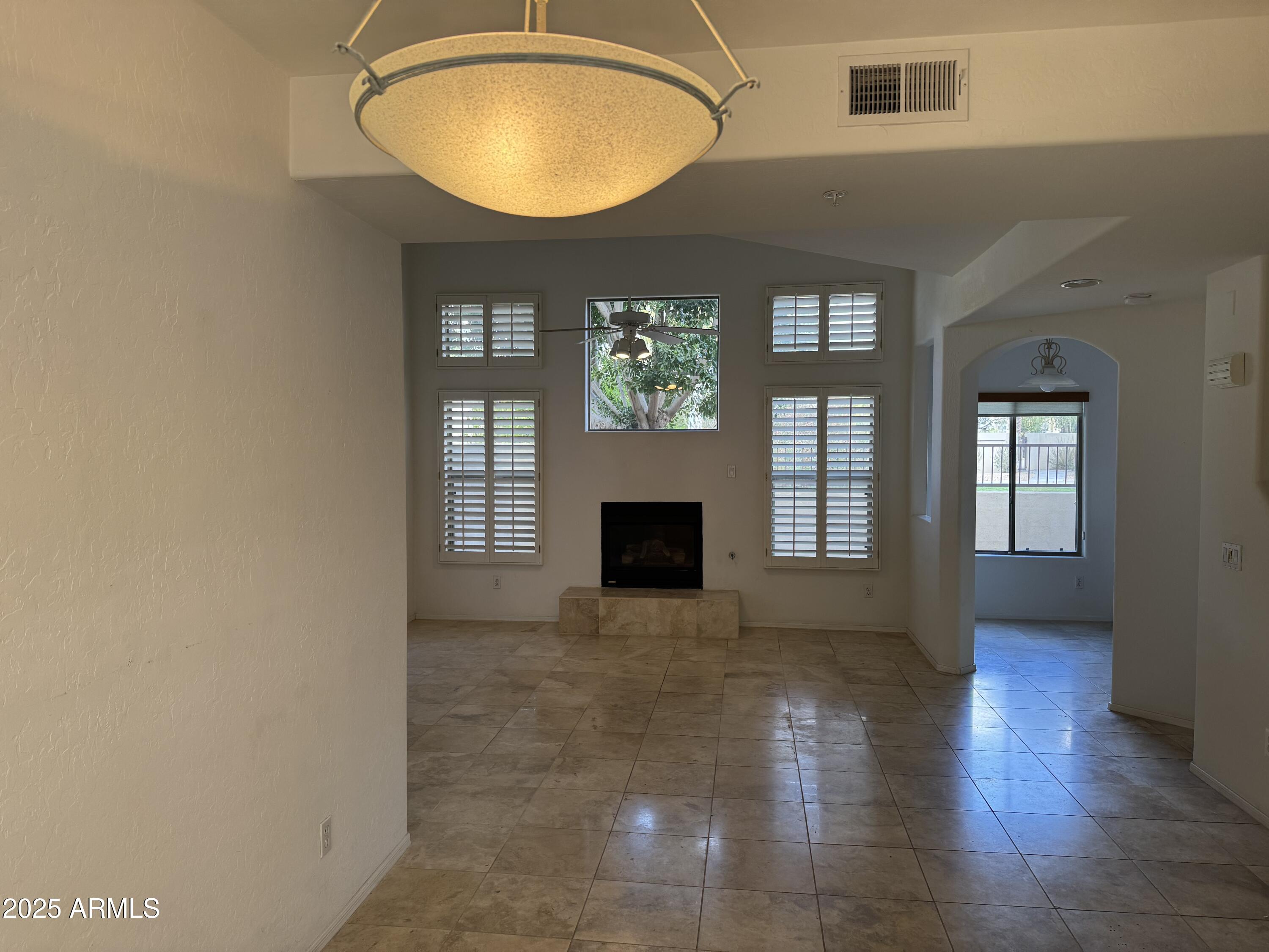 9065 East Gary Road, Unit 124 Scottsdale, AZ 85260 - Photo 5 of 52 POV from dining/front door- Great room