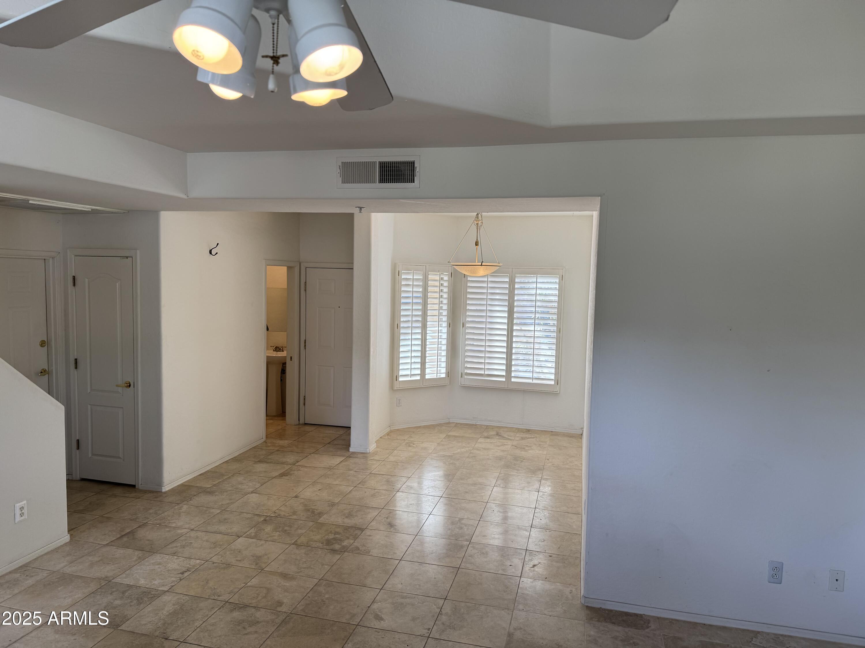 9065 East Gary Road, Unit 124 Scottsdale, AZ 85260 - Photo 7 of 52 POV from great room to dining/front door