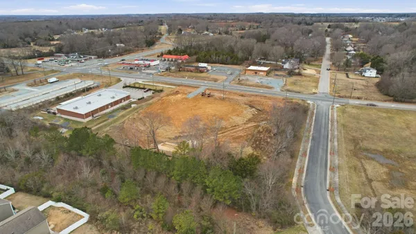 a view of a swimming pool with a yard