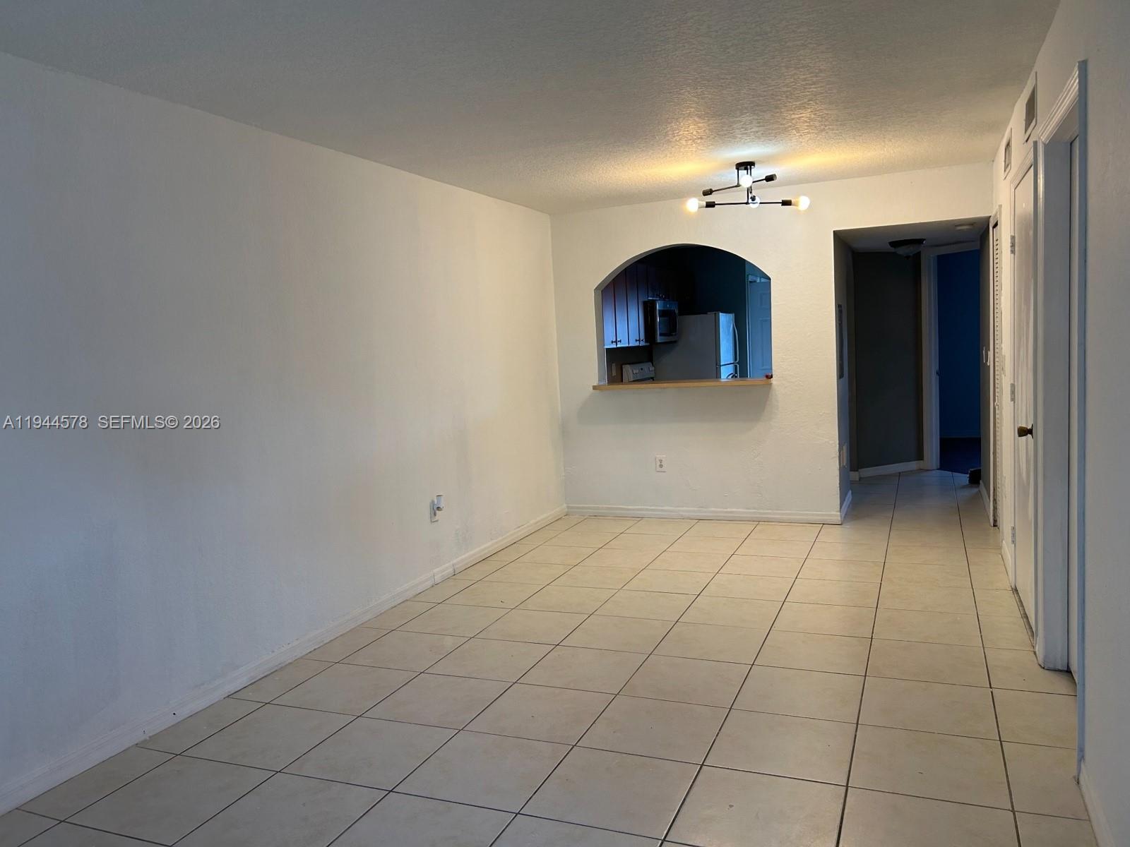 2921 Southeast 12th Road, Unit 10256 Homestead, FL 33035 - Photo 3 of 12 a view of a livingroom with a fireplace