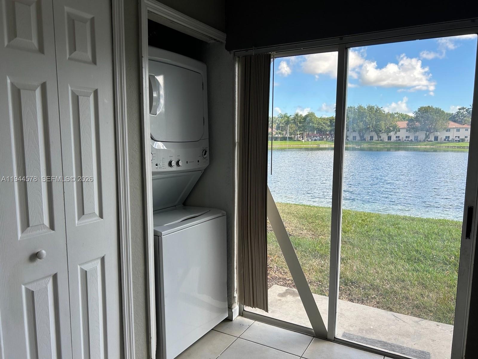 2921 Southeast 12th Road, Unit 10256 Homestead, FL 33035 - Photo 10 of 12 a view of swimming pool from a window
