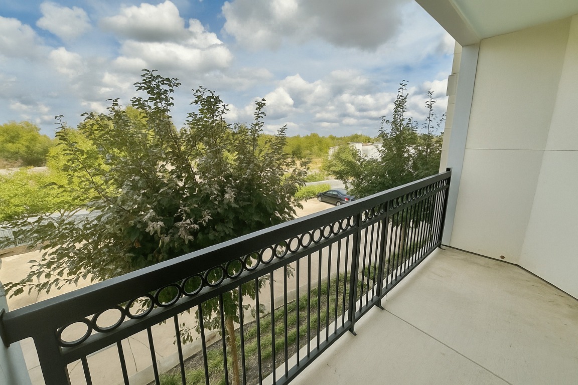 200 Maple Lane, Unit 1302 Elgin, TX 78621 - Photo 15 of 18 a city view from a balcony
