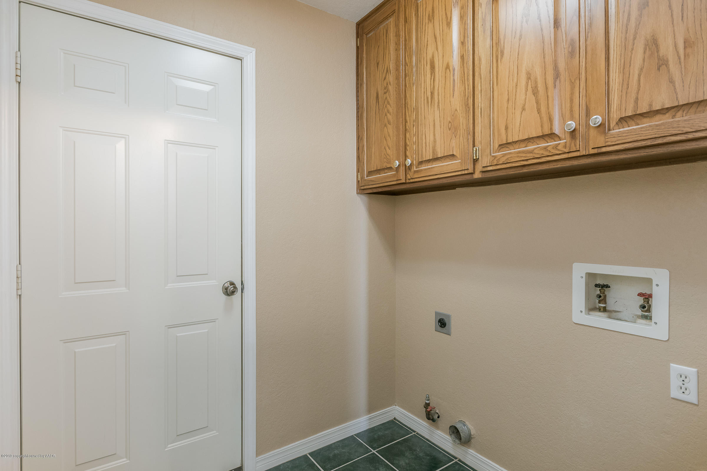 5404 Leo Lane Amarillo, TX 79110 - Photo 9 of 20 a view of storage and utility room with window